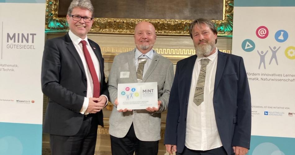 Fachbereichsleiter Lenz und Moser mit Bundesminister Polaschek
